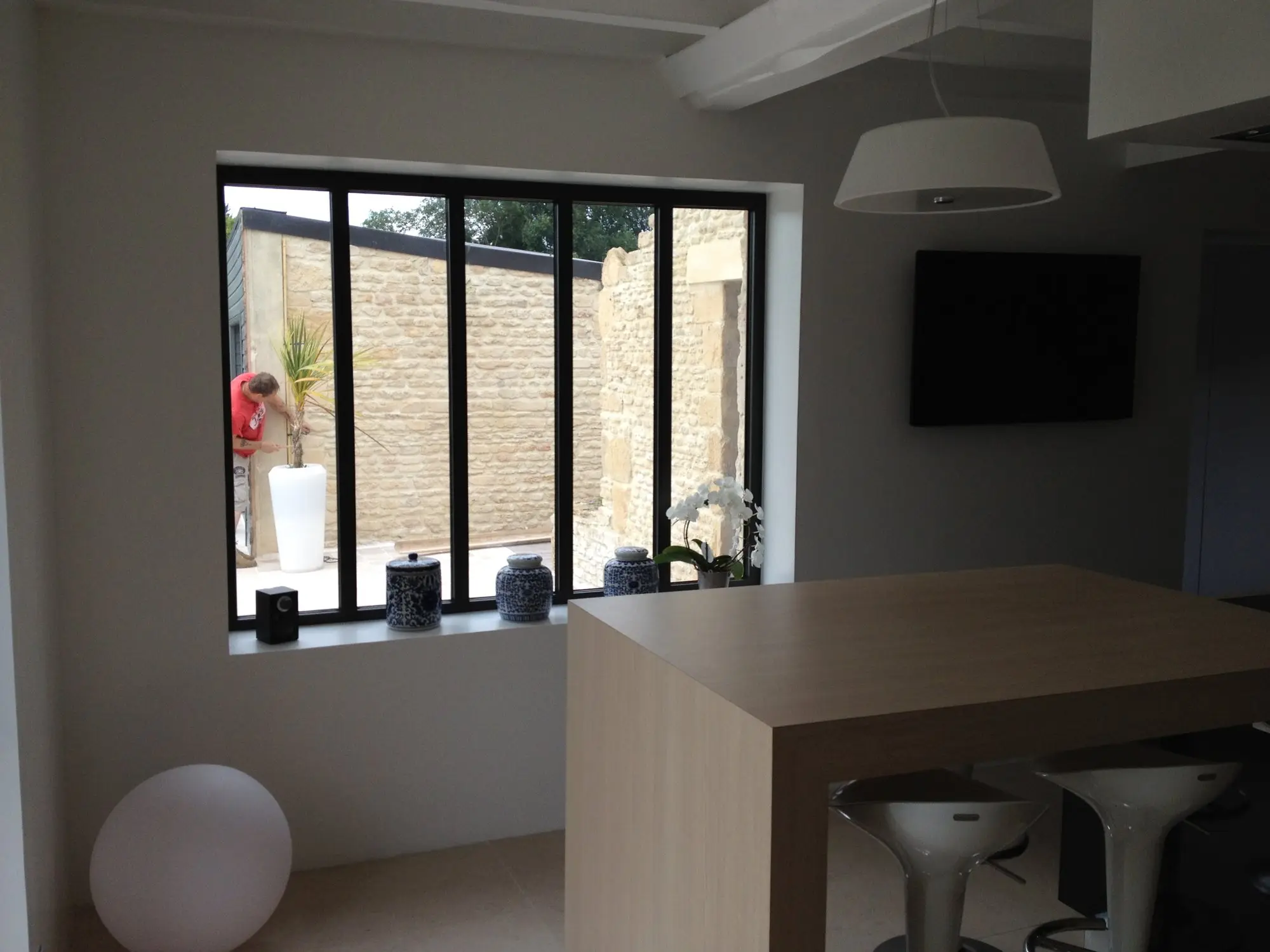 Living room with steel-frame bay window